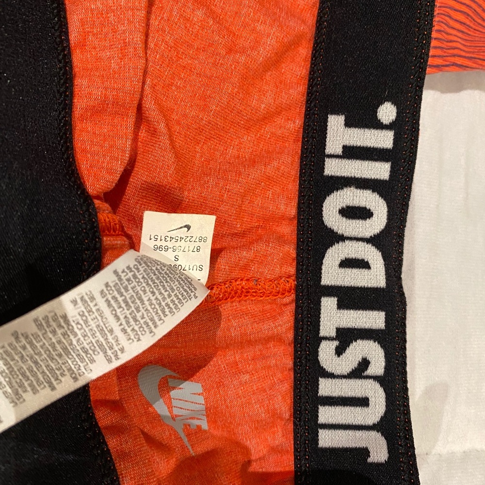 Orange and black Nike leggings